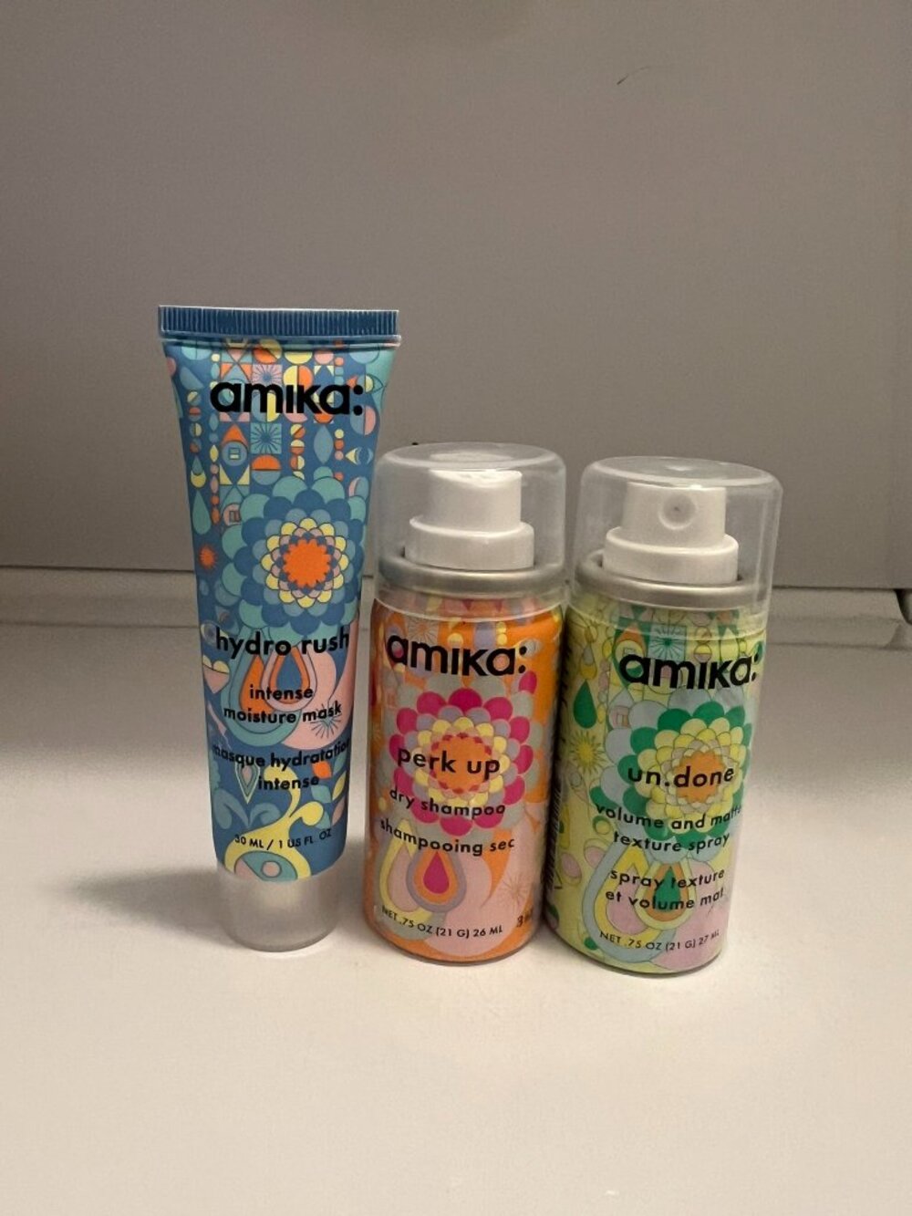 Amika travel sizes hydro rush mask, Perk up Dry shampoo, Undone Spray texture